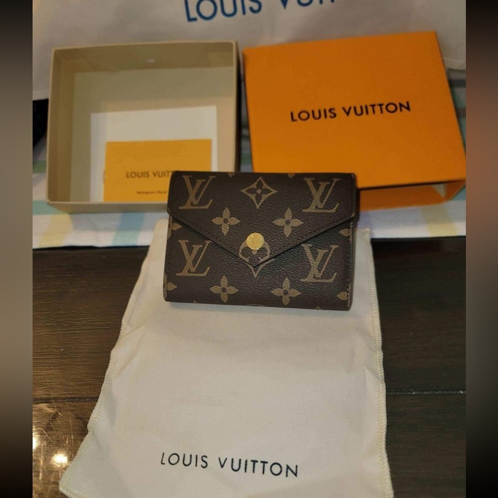 LV original Victorino wallet retails $575